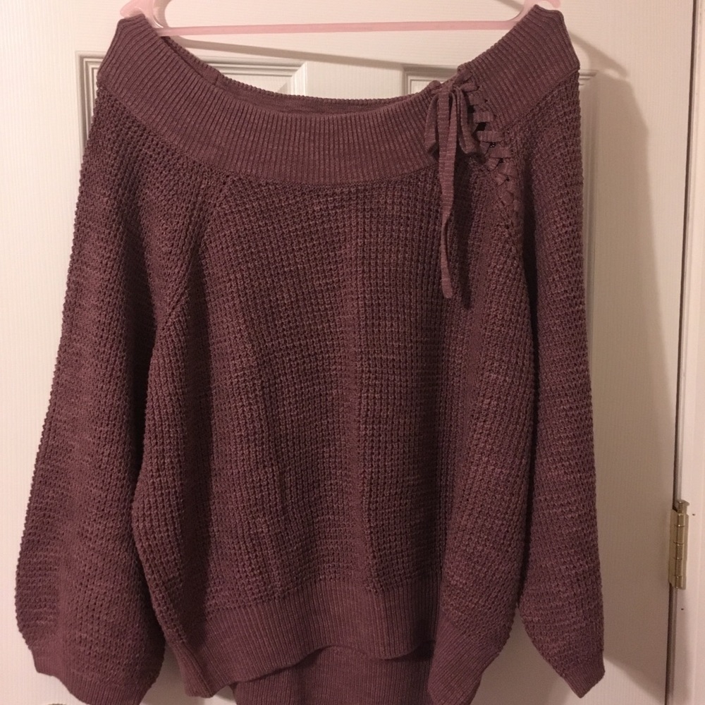 Sweater with ribbon tie detail on shoulder